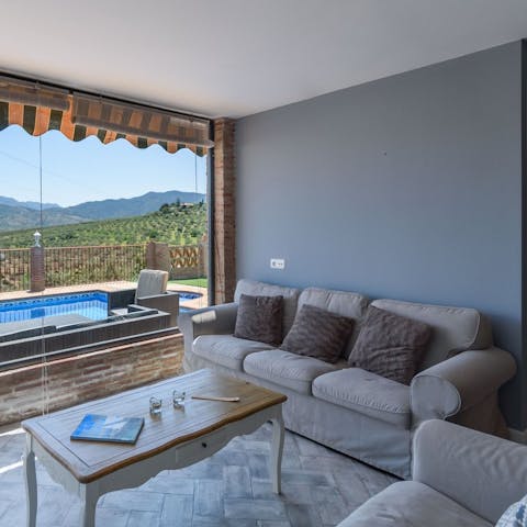 Sprawl out on the sofa and read in the flood of sunlight