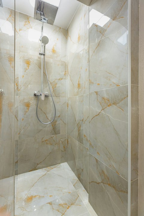 Cool off in the rainfall shower after a busy day of sightseeing