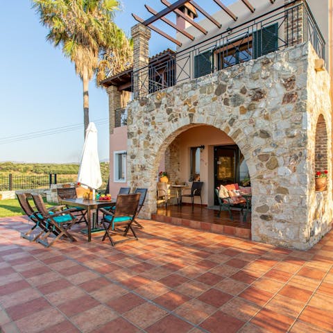 Gather around the dining table for an alfresco dinner