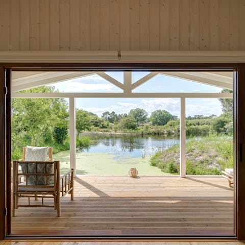 Wake up to stunning views across the lake