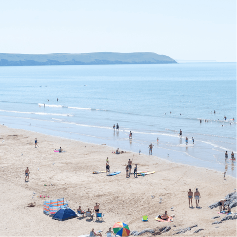 Explore Swansea Beach on the sandy coastline of South Wales, under a ten-minute walk away