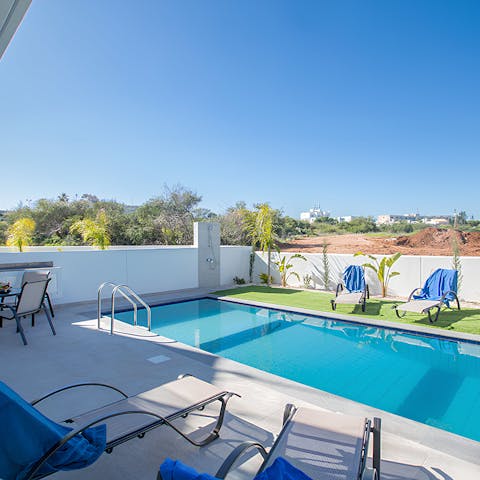 Spend days relaxing at home by the private swimming pool