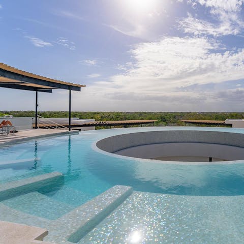 Head up to the rooftop to enjoy the communal pool