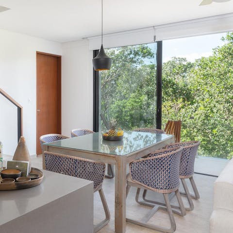Share delicious meals at the indoor dining table