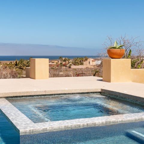 Let the Jacuzzi bubbles soothe you after a morning swim in the pool