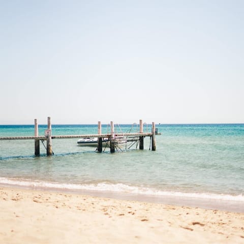 Stroll down to the secluded Playa Los Mangos and catch a golden tan