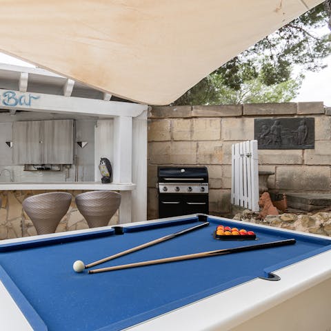 Organise a friendly snooker tournament in the outdoor bar space