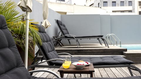 Grab a lounger and soak up the sun on the deck