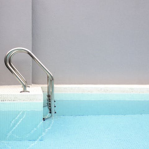 Take a refreshing dip in the swimming pool when the temperature rises