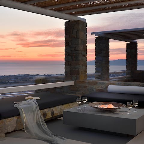 Get together for sundowners on the rooftop terrace