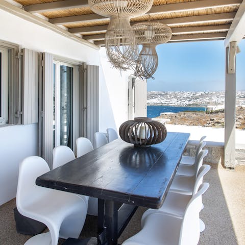 Serve up some local Greek delicacies at the alfresco dining area with a view