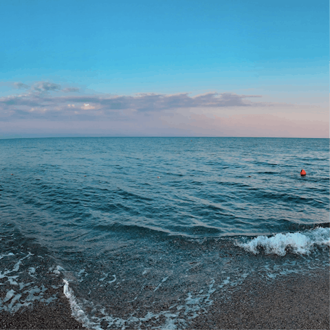 Cool off in the crisp waters of Spiaggia Longa, 300 metres away