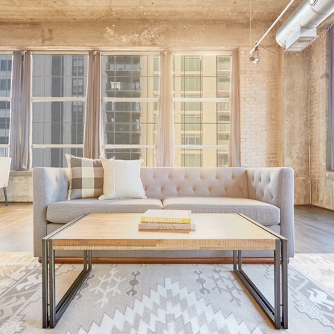 Steal a moment for yourself and relax with your book in the light-filled living space