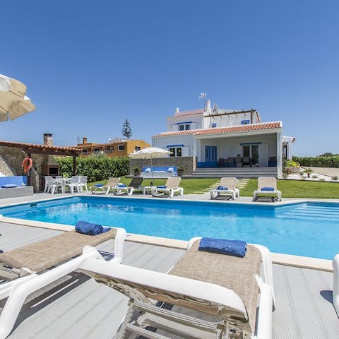 Lounge by the pool to achieve that gorgeous, sun-kissed glow