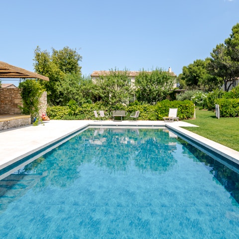 Spend the day relaxing in the private saltwater pool