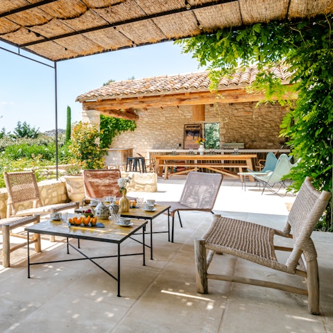 Gather on the terrace for dinner and drinks in the sunshine
