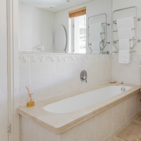 Soak your muscles in the tub after a long day of hiking the city's mountains