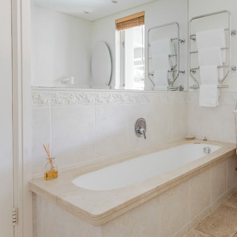 Soak your muscles in the tub after a long day of hiking the city's mountains