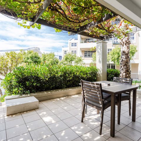 Spend sunny mornings on your leafy, private patio with an iced coffee in hand