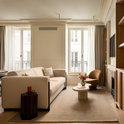 Curl up with a coffee and a guidebook in the chic living space