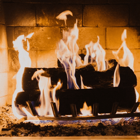 Snuggle up in front of the cosy log burner
