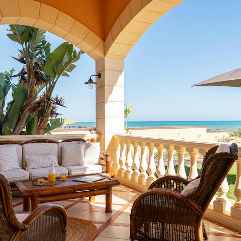 Relax on the terrace which directly faces the ocean