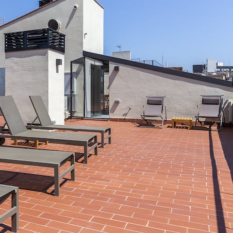 Take a glass of something chilled up onto the roof terrace