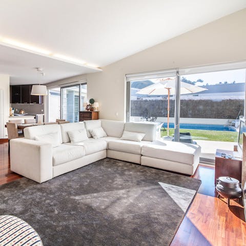 Open some Portuguese wine and stretch out on the L-shaped sofa