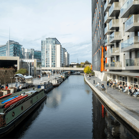 Walk fifteen minutes east and explore the bars, cafes and canals of Paddington Basin