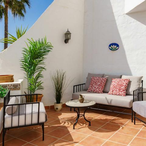 Sip Sangria on the terrace after days exploring Mijas