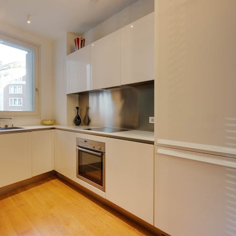 Prepare meals or snacks in the sleek kitchen