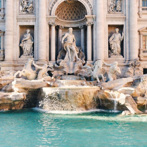 Take a stroll to the nearby Trevi Fountain