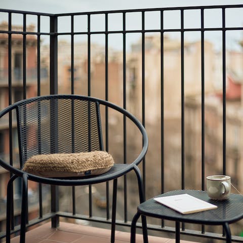 Soak up the city vibe from your balcony