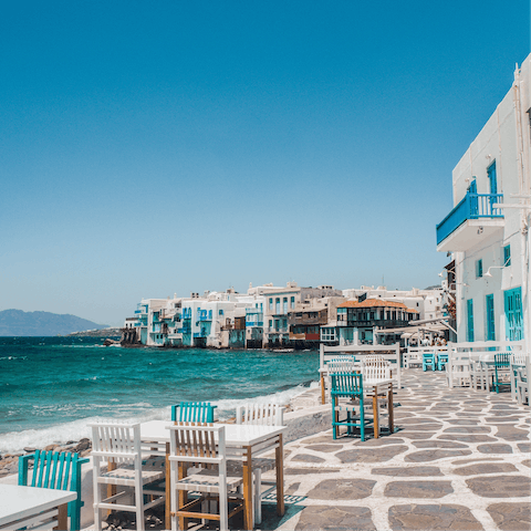 Drive ten minutes to reach the buzzing hotspot of Mykonos Town