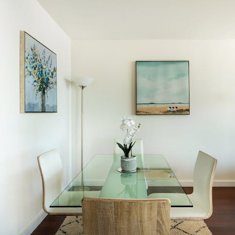 Serve home-cooked meals on the elegant glass table