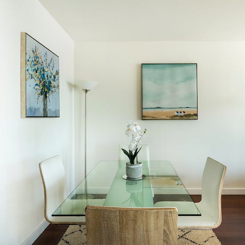 Serve home-cooked meals on the elegant glass table