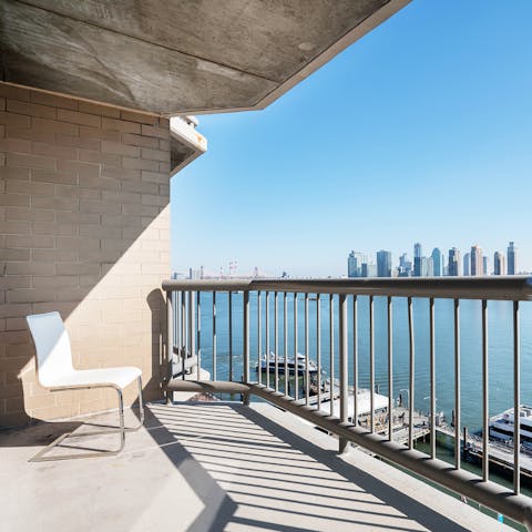 Open a cold beer and relax on the sunny private balcony