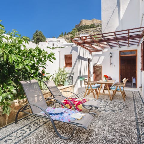 Soak up the Greek sunshine on the loungers