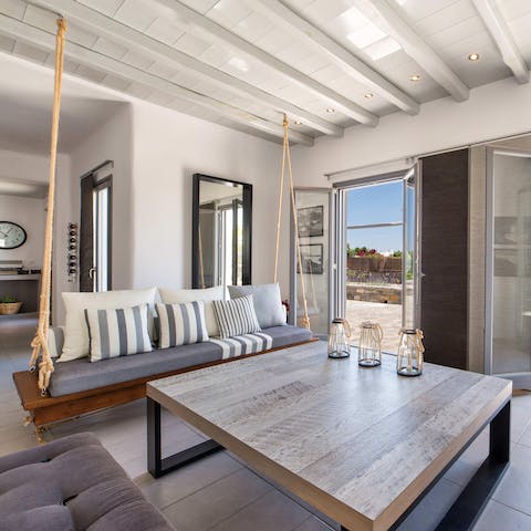 Relax in the living room after a day of discovering Paros