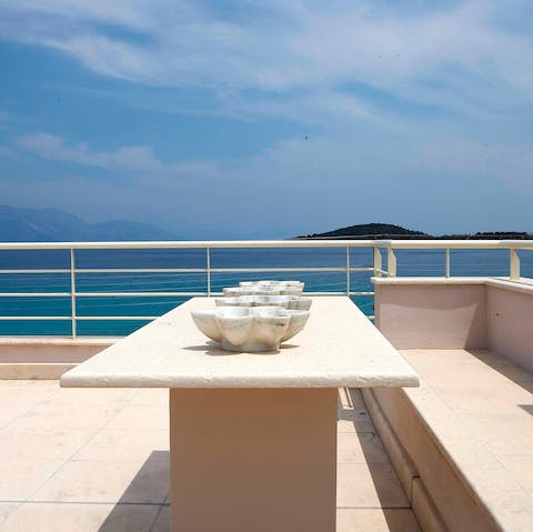 Head up to the rooftop terrace for an uninterrupted view of the ocean