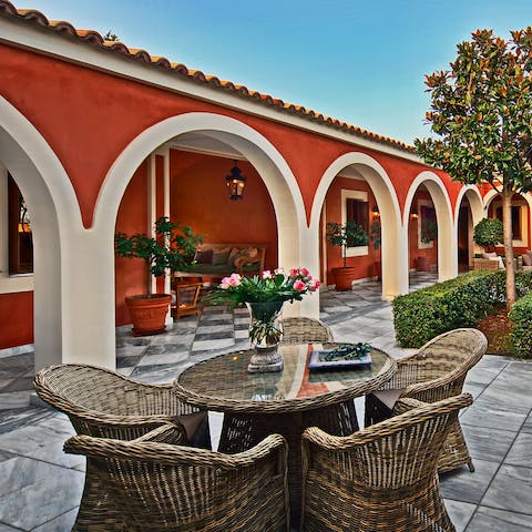 Sip on cocktails out on the courtyard while you watch the sunset