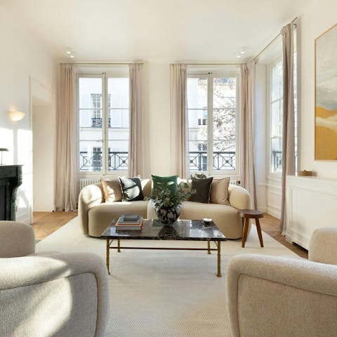 Enjoy a glass of Champagne in the elegant living room
