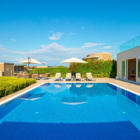 Spend blissful days stretched out by the pool