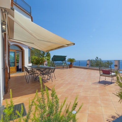 Catch the sun on the terrace with views of the sea