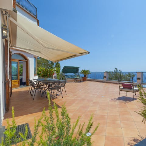 Catch the sun on the terrace with views of the sea