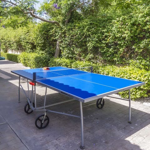 Get competitive with a table tennis tournament in the sunshine