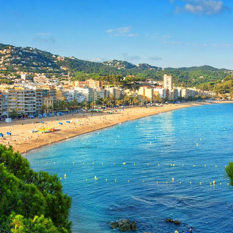 Make the short drive into Lloret de Mar and spend the day the beach