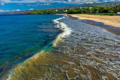 Swim at Hapuna Beach, one of Hawaii's finest stretches of sand, a twenty-minute drive