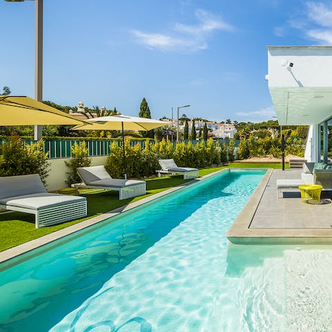 Jump into the sparkling swimming pool to cool off