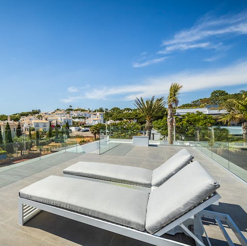 Admire the views from your sun lounger on roof